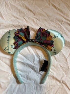 Sally NBC Mickey Ears Headband with Patterned Bow